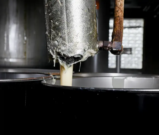 adhesive pouring out of a tube