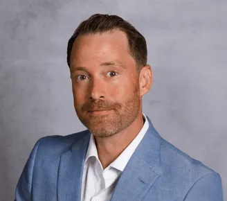 a head shot of AJ Bertke