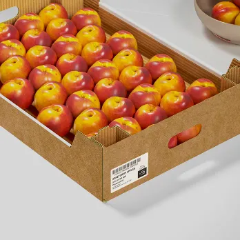 labeled cardboard box filled with apples