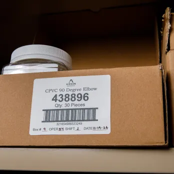 Cardboard box with barcode label for PVC 90 degree elbows