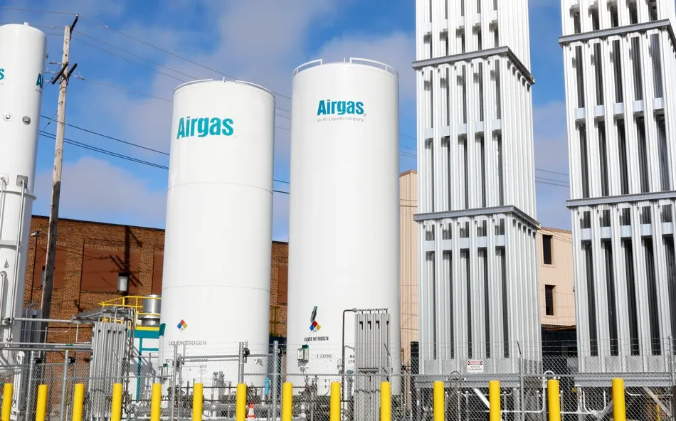 Large industrial silos and energy-efficient equipment at manufacturing facility