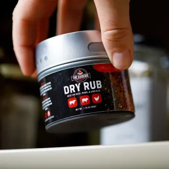 Industrial label printer producing rolls of custom thermal labels in production facility