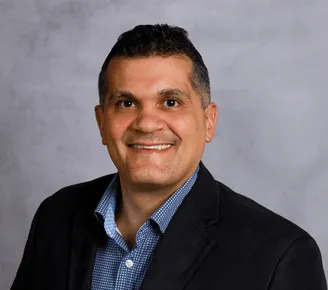 a head shot of Eric DePhillips