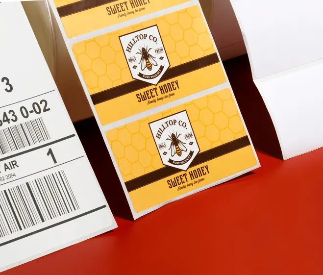 3 rolls of labels, the center roll is for sweet honey