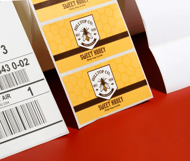 3 rolls of labels, the center roll is for sweet honey