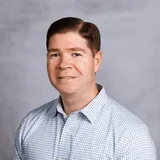 a head shot of Mike Reese