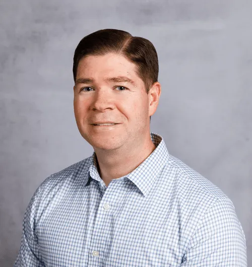 a head shot of Mike Reese