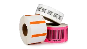 Custom label rolls with barcodes and colorful designs including pink and orange labels