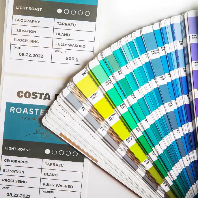 Orange LPN barcode label on cardboard box with hand holding it