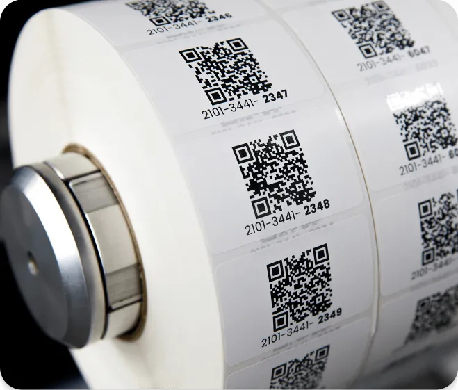 a very large roll of preprinted QR code labels