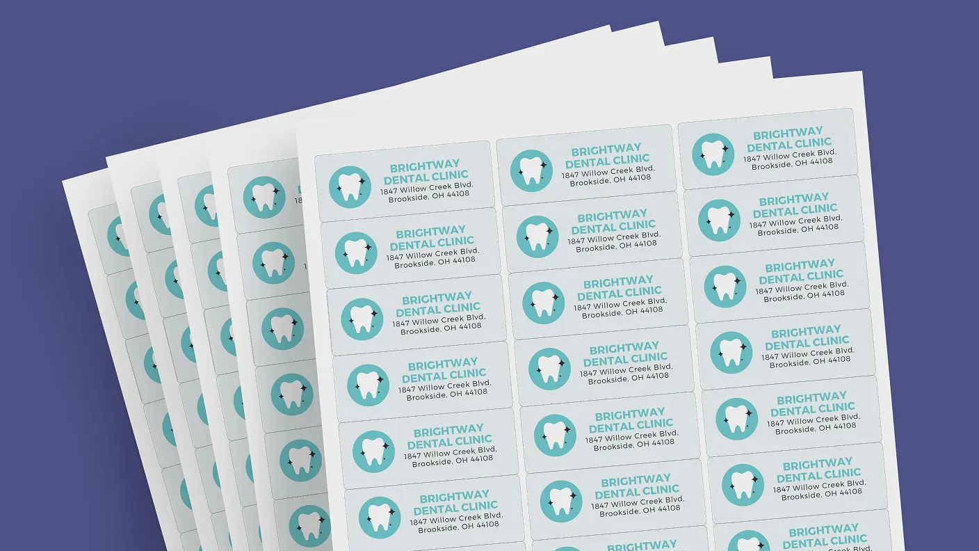 a stack of sheet labels for a dental clinic