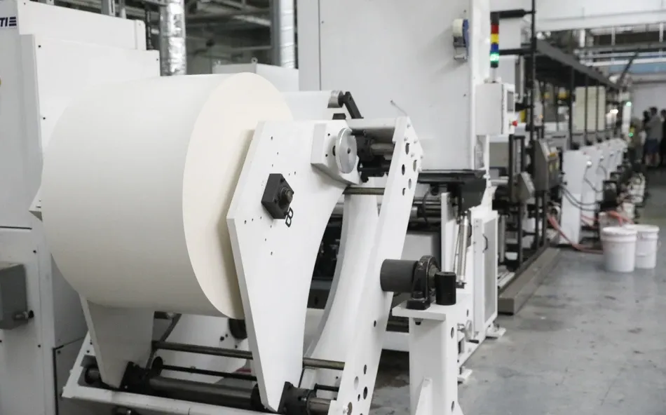 Large paper roll in manufacturing facility