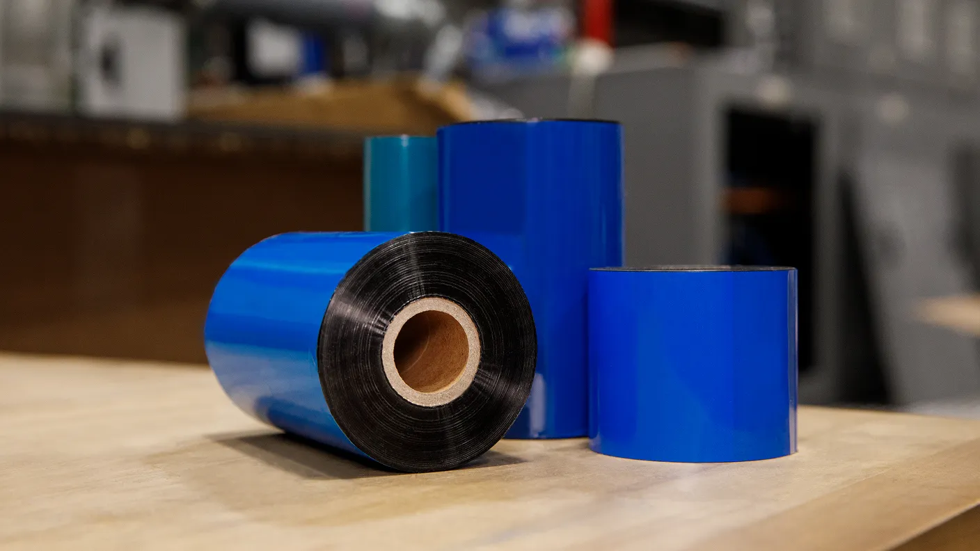 3 rolls of thermal ribbons on a table